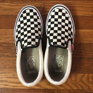 Vans checker slip ons
